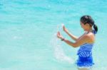 Happy Girl In The Sea Stock Photo