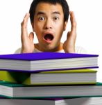 Man Shocking With Looking Books Stock Photo