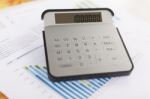 Business Analysis - Accounting Report With Calculator Stock Photo