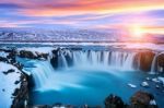 Godafoss Waterfall At Sunset In Winter, Iceland Stock Photo