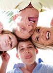 Family Members Keeping Their Heads Together Stock Photo