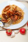 Italian Seafood Spaghetti Pasta On Red Tomato Sauce Stock Photo