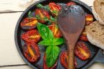 Baked Cherry Tomatoes With Basil And Thyme Stock Photo