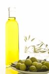 Bottle Of Olive Oil With Olives Stock Photo