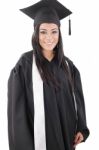 Graduation Of A Woman Dressed In A Black Gown Stock Photo