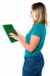 Young Woman With Calculator Stock Photo