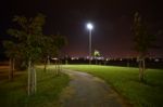 Night Public Park In The City With Houses Near Stock Photo