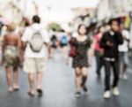 Blurred People Walking On The Street Stock Photo