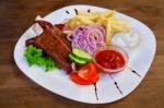 Grilled Meat With Potatoes Stock Photo