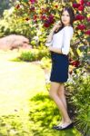 Young Beautiful Tall Woman With Long Straight Dark Hair Posing A Stock Photo