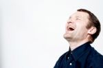 Portrait Of Hard Laughing Man Stock Photo