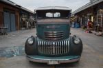 Old Vintage Green Chevrolet Truck At Night Market, Srinakarin Ro Stock Photo