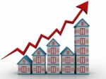 Red Graph And Houses: Growth In Real Estate Stock Photo