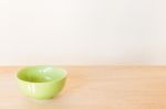 Empty Bowl On Rustic Wooden Background Stock Photo