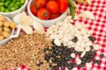 Variety Of Kitchen Ingredients With Fresh And Dried Legumes Stock Photo