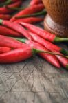 Red Chilli For Thai Food On Wood Tacble Stock Photo