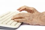 Elderly Woman Hands On Keyboard Stock Photo