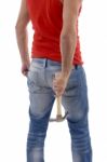 Back Pose Of Man Holding Hammer Stock Photo