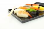 Sushi Black Rectangle Plate Focus Shrimp On White Desk Stock Photo