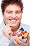 Chubby Man With Fresh Salad Stock Photo