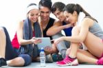 Young People Looking At Digital Table In The Gym After Making Ex Stock Photo