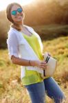 Beautiful Young Woman Enjoying Summer In A Field Stock Photo