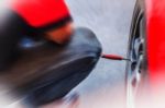 Man Inflate Tires In The Garage Stock Photo