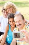 Happy Family Taking Self Portrait Stock Photo