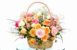 Basket With Colored Roses Stock Photo