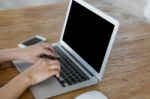 Closeup Of Business Woman Hand Typing On Laptop Keyboard Stock Photo