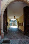 View Through Double Wooden Doors Into A Courtyard In Strasbourg Stock Photo