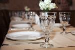 Glasses And Plates On Table Stock Photo