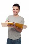 Man Studying With Dossier Stock Photo