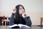 Portrait Of Thai Teen Beautiful Girl Writing Book Stock Photo