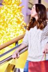 Beautiful Young Woman Holding Shopping Bags Stock Photo