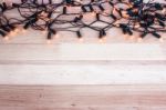 Christmas Lights,garland Lights On Wooden Background Stock Photo