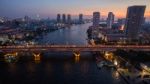 Aerial View Of Beautiful Dusky Time Chaopraya River And Takson Bridge Important Landmark In Heart Of Bangkok Thailand Capitabl Stock Photo