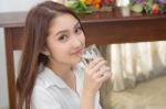 Cute Lady Drinking Pure Water Stock Photo