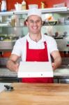 Here Is The Pizza You Ordered! Stock Photo