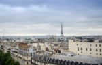 Roofs Of Paris With Eiffel Tower In Background Stock Photo