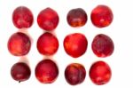 Tasty Red Plum Fruits Isolated On White Background Stock Photo