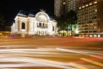 The Opera House Of Saigon Vietnam With Stream Of Passing Traffic Stock Photo