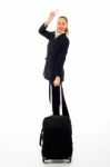 Businesswoman With Travel Bag Stock Photo