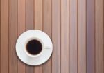 Top View Of Cup On Wooden Background Stock Photo