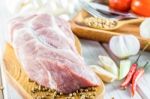 Raw Pork Tenderloin On A Cutting Board Ready To Cook Stock Photo