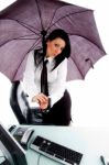 Female Holding Umbrella And Posing Stock Photo