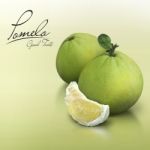 Pomelo On Green Solid Background Stock Photo