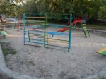 Children Playground, Swing Near The House  Stock Photo