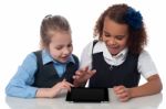 Excited Kids Using Tablet Pc Stock Photo