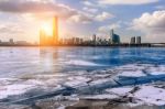 Ice Of Han River And Cityscape In Winter,sunset In Seoul, South Korea Stock Photo